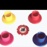 Park Golf golf ball tees. Colors: Yellow, Red, Pink, Blue